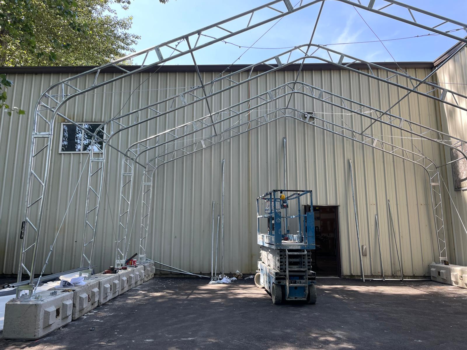 Fabric structure steel framing being erected